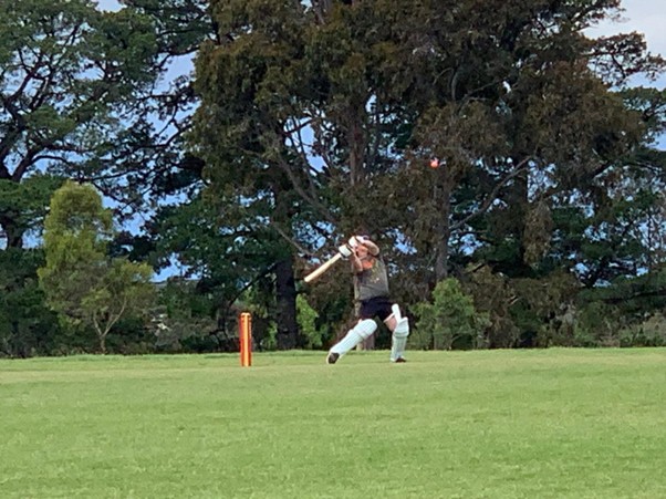 Fargo valiantly attempting to overhand a ball that is 1.5m over his head 1m before it even reaches him
